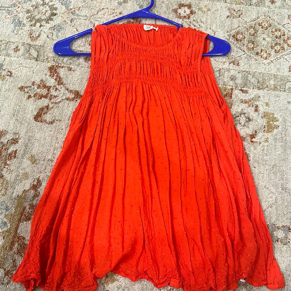 Gap xs orange blouse smocked at top.